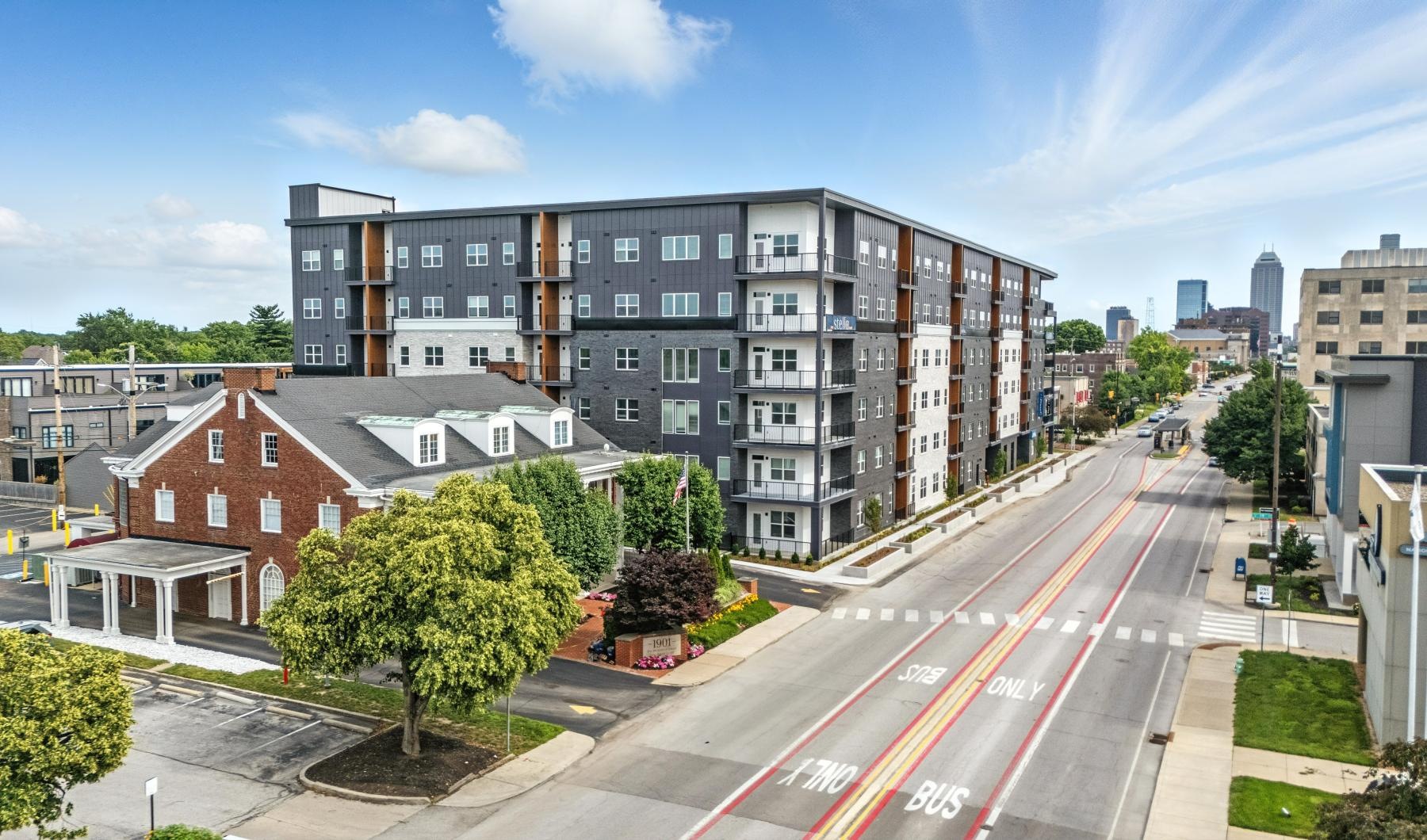 a street view of a multi story  building